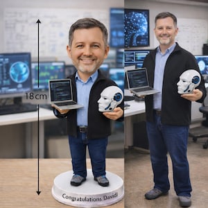 May include: A figurine of a man holding a laptop and a robot head, standing on a white base. The base reads "Congratulations David!" The figurine is approximately 7 inches tall. The man is wearing a black jacket, blue shirt, and jeans.