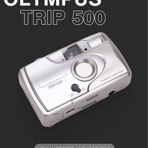 Olympus trip 500 camera 35 mm film camera— 35mm point-and-shoot film camera, focus-free lens, built-in flash, tested