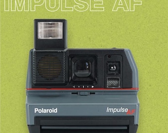 Polaroid Impulse AF: película 600, cuerpo gris, enfoque automático, flash incorporado, probada y lista para disparar.