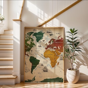 May include: A framed world map with a vintage aesthetic. The map features continents in shades of green, red, and yellow, with nautical illustrations of ships and compasses. The map is displayed in a light-colored wooden frame.