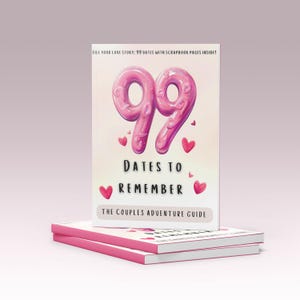 Pode incluir: Dois livros com capas rosa empilhados. O livro superior apresenta um grande "99" rosa e as palavras "Dates to Remember" com ilustrações de corações. O texto "Fill your love story: 99 dates with scrapbook pages inside!" está no topo.