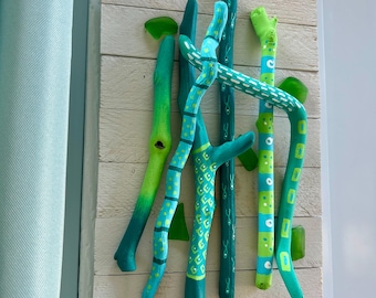 Decoración de pared con motivos de madera a la deriva en la playa: decoración del lago Michigan.