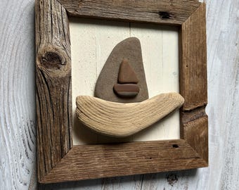Veleros de roca estratificada sobre una ola de madera a la deriva