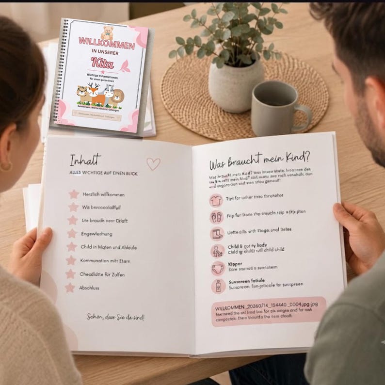 May include: A spiral-bound information booklet titled Willkommen in unserer Kita with a pink border and animal illustrations. The open pages display a table of contents titled Inhalt and a section titled Was braucht mein Kind with icons.