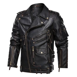 May include: Black leather jacket with an asymmetrical zip, multiple zipped pockets, and a notched lapel. The jacket has a classic biker style with a belted waist and shoulder epaulettes. The stitching is a contrasting brown colour.