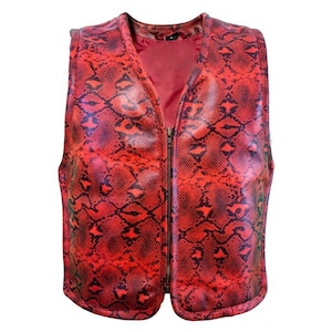May include: A red and black snakeskin-patterned vest with a V-neck and a full-length zipper. The vest is sleeveless and made of a shiny material. The interior lining is red.