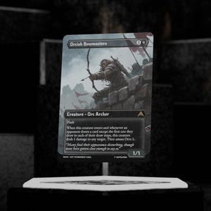 May include: A fantasy card featuring an Orc archer with a bow, part of a larger battle scene. The card is labeled "Orcish Bowmasters" and includes game text. The card is a 1/1 and is marked as "PROXY - NOT TOURNAMENT LEGAL."