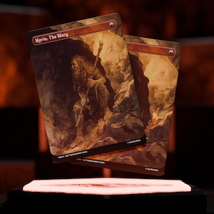 May include: Two trading cards featuring the artwork of a bearded man holding a torch in a cave. The cards have a brown and tan color scheme with the text "Norin, The Wary" at the top. The cards are labeled "PROXY - NOT TOURNAMENT LEGAL".