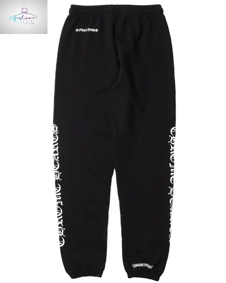 May include: Black sweatpants with white lettering down the sides and on the back. The text includes the words "Chrome Hearts". The sweatpants have an elastic waistband and cuffs.