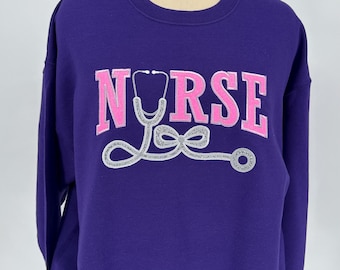 Glitter HTV Applique Embroidered Nurse Sweatshirt | Coquette Design Nurse Sweatshirt