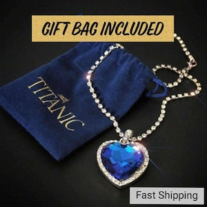 Oceaanblauwe harthanger met cadeauzakje met Titanic-thema
