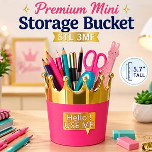 May include: A pink cylindrical storage bucket with a gold crown-shaped rim and a gold speech bubble label that reads Hello! USE ME. The bucket is 14.48 cm tall and contains various pens, pencils, scissors, and a pink rabbit-shaped ruler.