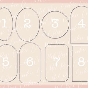 Peut inclure: Une collection de huit emporte-pièces argentés de différentes formes : deux ovales, un cercle, deux rectangles arqués et trois rectangles. Chaque emporte-pièce a un numéro blanc à l'intérieur. Le fond est rose clair.