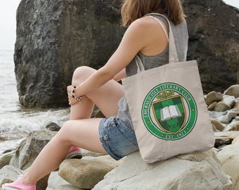 Bolso con escudo celta, logotipo de herencia irlandesa y nudos serif gaélicos.