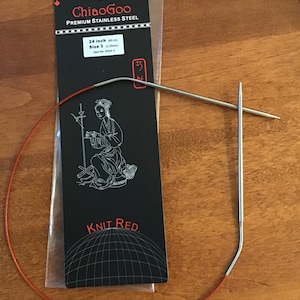 May include: A 24-inch, size 3 (3.25mm) ChiaoGoo Knit Red circular knitting needle with a stainless steel tip and a red cord.