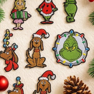 Op de afbeelding: Een verzameling kerstgeborduurde patches met personages uit een vakantieverhaal. De patches bevatten de Grinch, Cindy Lou Who en Max de hond, allemaal met kerstmutsen en feestelijke kleding.