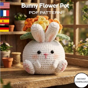 May include: A white crocheted bunny flower pot with a round body, large ears, and pink accents. The bunny holds a bouquet of orange and yellow flowers. Text on the image reads "Bunny Flower Pot PDF Pattern" and "Instant Download".