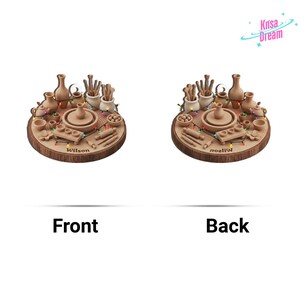 May include: A wooden pottery wheel scene with miniature pottery tools, pots, and a wheel. The scene is arranged on a round wooden base with the name "Wilson" engraved. Decorative lights are strung around the scene.