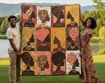 May include: A colorful quilt featuring a grid of African women's silhouettes in various head wraps and jewelry. The quilt showcases a palette of warm tones, including brown, gold, and peach. The design is held up by two people in a grassy outdoor setting.