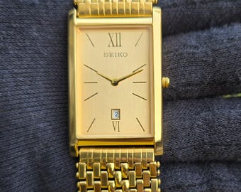 Seiko 3421 Vintage Gold Tone Tank Watch Quartz Men Women  display picture 3