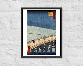 Lluvia repentina sobre el puente Shin-Ōhashi y cartel enmarcado de Atake - Utagawa Hiroshige