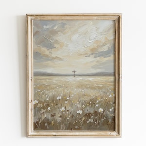 May include: Oil painting in a distressed wooden frame. The artwork depicts a field of white flowers with a cross on the horizon under a cloudy sky. The sky is painted in beige and grey tones, with visible brushstrokes.