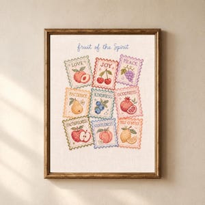 May include: A framed cross-stitch embroidery titled Fruit of the Spirit, featuring nine postage stamp-shaped designs. Each stamp depicts a different fruit and a corresponding virtue, including love, joy, peace, patience, kindness, goodness, faithfulness, gentleness, and self-control in colorful thread.
