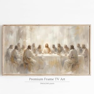 Op de afbeelding: Een ingelijste prent van een religieus schilderij dat het Laatste Avondmaal uitbeeldt. Het kunstwerk toont een centrale figuur omringd door twaalf anderen aan een tafel. Het kleurenpalet is zacht, met beige en lichtbruine tinten. De tekst "Premium Frame TV Art" staat onderaan.