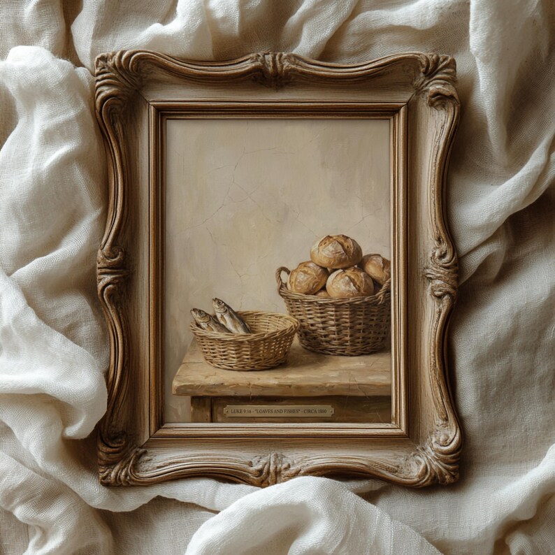 May include: A framed still life painting depicts two woven baskets on a wooden surface. One basket holds several round loaves of bread, and the other contains small fish. The frame is ornate with a light brown finish.