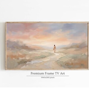 K&ouml;nnte beinhalten: Gerahmtes Landschaftsgem&auml;lde mit einer Figur, die auf einem Pfad geht. Das Kunstwerk zeigt eine warme Farbpalette aus Pfirsich-, Beige- und Blaut&ouml;nen, mit dem Text "Premium Frame TV Art" unten.