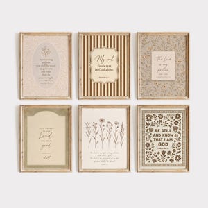 May include: A set of six rectangular wall art prints in light wood frames. The prints feature various beige, brown, and cream designs with floral patterns, vertical stripes, and religious text including Psalm 30:15, Psalm 62:1, Lamentations 3:24, Psalm 107:1, Psalm 27:1, and Psalm 46:10.