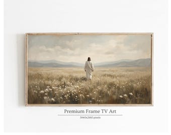 May include: Framed landscape art print featuring a figure in white walking through a field of wildflowers. The artwork has a muted color palette with a light brown wooden frame. The text "Premium Frame TV Art" is at the bottom.