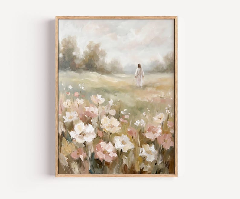 May include: A framed art print featuring a pastoral scene. The artwork depicts a figure walking through a field of wildflowers in soft pastel colors. The foreground is filled with white and pink flowers, with a blurred background of trees and sky.
