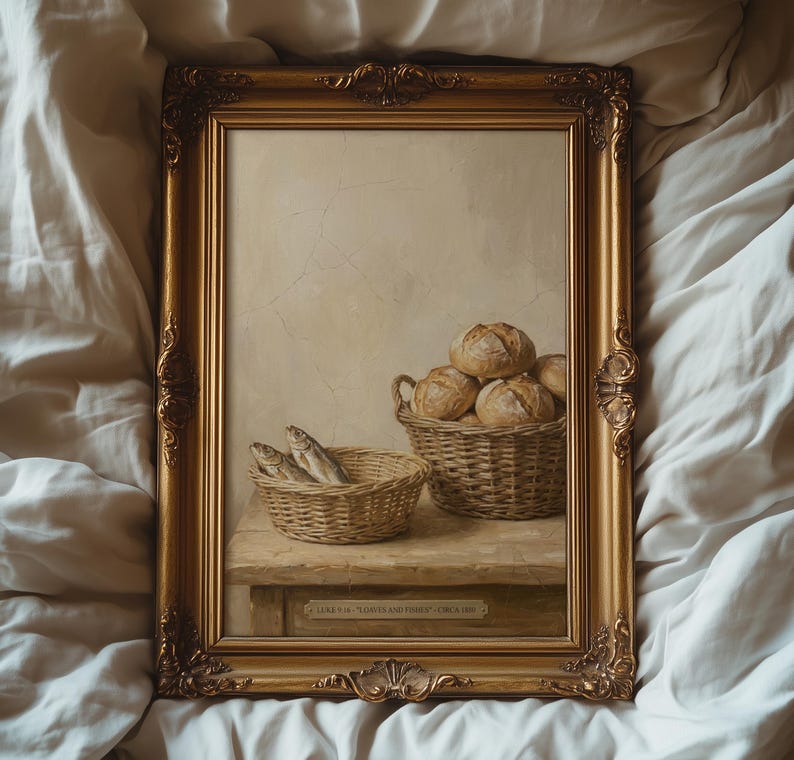 May include: A framed painting with a gold ornate frame. The painting depicts a still life with two woven baskets, one with fish and the other with bread rolls. The background is a light beige color. The painting is labeled "Luke 5:16 'Lower and Fishes' - Circa 1899."