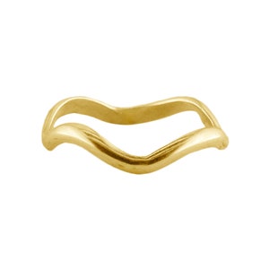 May include: A gold-colored ring with a wavy design. The ring is made of metal and has a smooth finish.