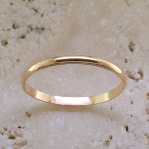 wedding band on thumb