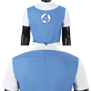 May include: A light blue vest with a white high-neck shirt underneath. The vest features a circular emblem on the chest displaying the number 4 in a light blue font. The garment includes visible stitching details and a white belt at the waist.