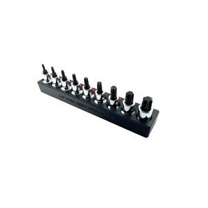 May include: A black Torx drive organizer holding a set of silver and black Torx bits. The organizer has the text "1/2 TORX DRIVE ORGANIZER" printed on it. The bits are arranged in a row.