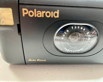 Polaroid Captiva SLR Instant Film Camera, Auto Focus, Vintage old camera