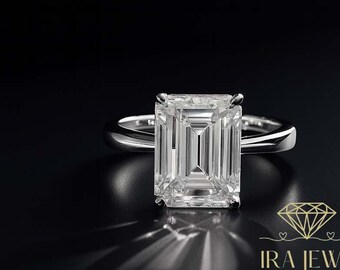 Moissanietring smaragd geslepen • Witgouden solitaire verlovingsring