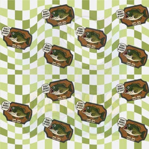 May include: A repeating pattern featuring mounted fish plaques with the text "DON'T WORRY BE HAPPY" in a speech bubble. The fish are green and white, mounted on wooden plaques, set against a wavy green and white checkered background.