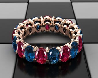 Anillo de eternidad con rubí y topacio azul de Londres, chapado en oro de 14 quilates.