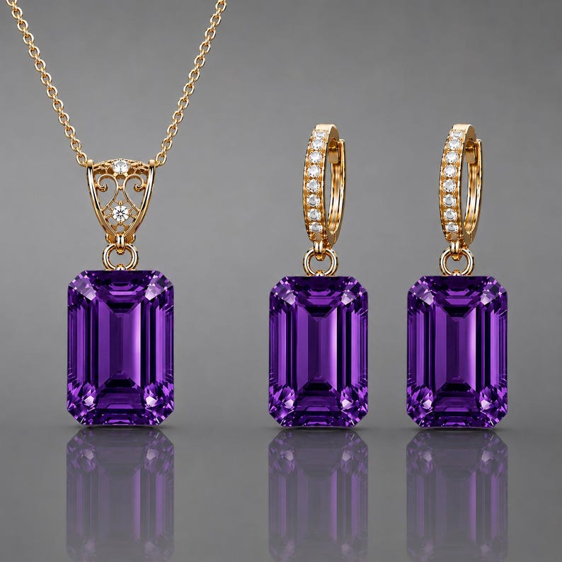 May include: A jewelry set consisting of a gold necklace and a pair of matching gold hoop earrings. Each piece features a large, rectangular, deep purple amethyst gemstone. The necklace bail and earring hoops are accented with small, clear, round stones.