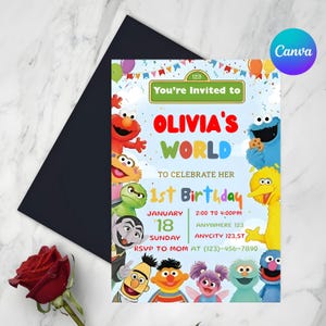 May include: A colorful birthday invitation featuring Sesame Street characters. The invitation reads "Olivia's World" and includes details for a 1st birthday celebration, such as the date, time, and RSVP information. A black envelope and a red rose are also visible.