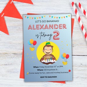 May include: A birthday invitation with the text "LET'S GO BANANAS! ALEXANDER is turning 2". The invitation features a cartoon monkey, balloons, and a birthday cake. The invitation is light blue with red and yellow accents.