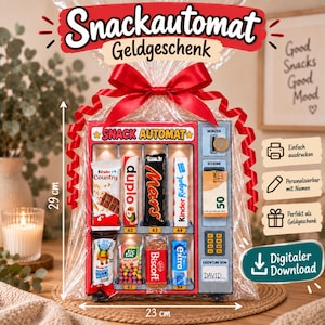 May include: A snack vending machine gift box measuring 29 cm by 23 cm, wrapped in clear plastic with a red ribbon. It contains various candy bars and snacks, a slot for coins and bills, and a label with the name David. Text includes Snackautomat.