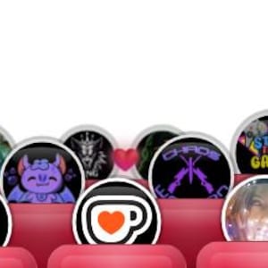 May include: A collection of round, glossy buttons with various colorful designs. The buttons feature images of anime characters, gaming logos, and other graphics. They are displayed on a red, tiered surface.