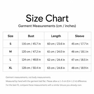 May include: A size chart for a garment with columns for size, bust, length, and sleeve measurements in both centimeters and inches. It lists sizes S, M, L, and XL with specific values for each, noting that these are garment measurements.