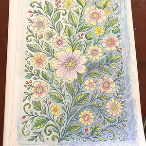 May include: A floral coloring page featuring a detailed botanical design. The illustration showcases a variety of flowers in shades of pink and yellow, with green leaves and stems. The background is shaded in blue.