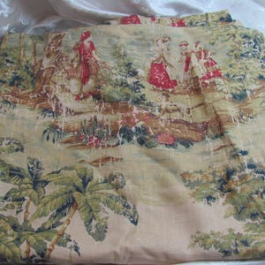 May include: Cream-colored fabric with a pastoral scene featuring figures in red and white clothing, trees, and palm trees. The fabric has a vintage, slightly faded appearance, suggesting an antique or retro style.